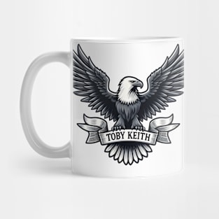 An eagle holds a sign that says Toby Keith Mug